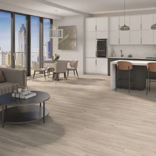 Close-up view of Rigid Core LVT flooring showing realistic wood texture and durable waterproof vinyl surface.